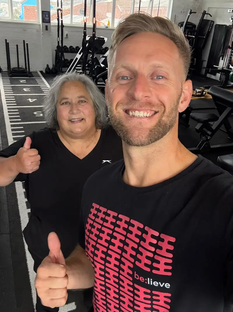 Paul Shannon, founder of Be:Unique, with a member