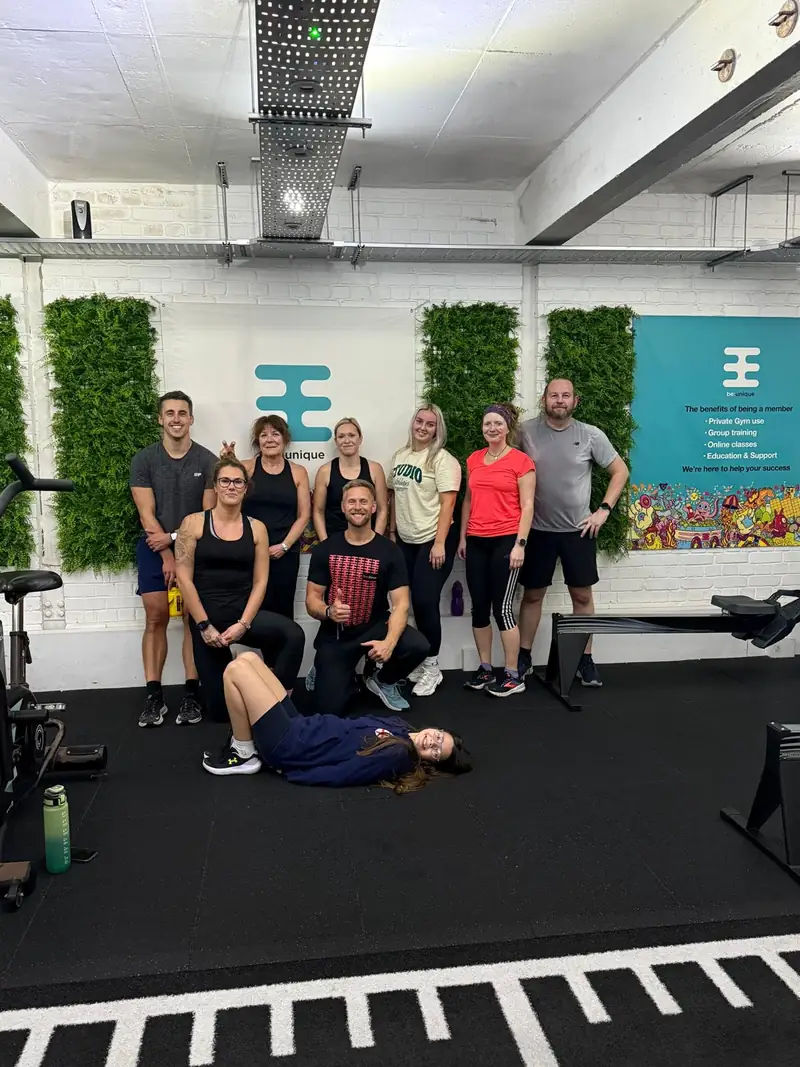 The bootcamp crew together after a session, one of them lying on the floor for a laugh